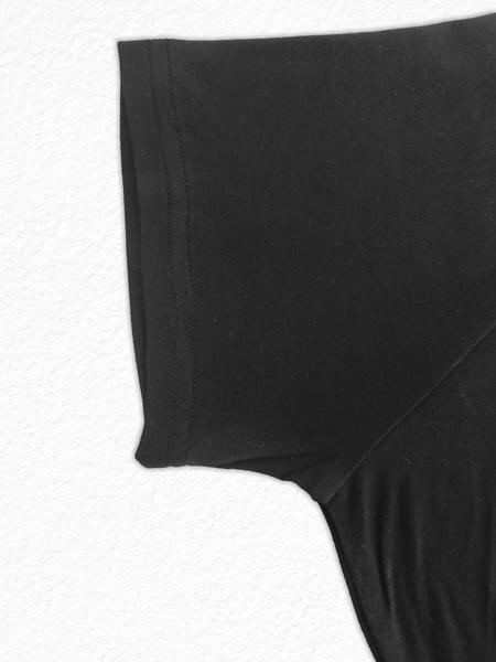 A women's elegant casual square-neck short-sleeved top with a bohemian floral print jumpsuit, a comfortable style for beach vacations and events.