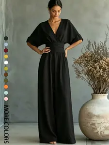Summer new fashionable and high-end V-neck one-piece wide leg pants with cinched waist for slimming effect. Bubble sleeve design is suitable for daily travel, outdoor lawn banquets, light wedding outfits, afternoon tea, commuting