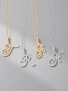 Trendy and cool 26-letter necklace. Choose freely between cursive and grass script styles. 18K with zircon inlays. Suitable for both clubbing and daily wear