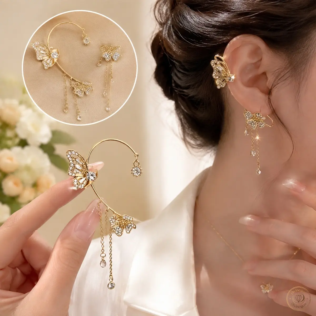 A pair of women's butterfly crystal clip-on earrings featuring dangling chain pendants and rhinestone-studded floral accents. Lightweight and comfortable to wear without the need for pierced ears, these elegant, exquisite tassel earrings are suitable for