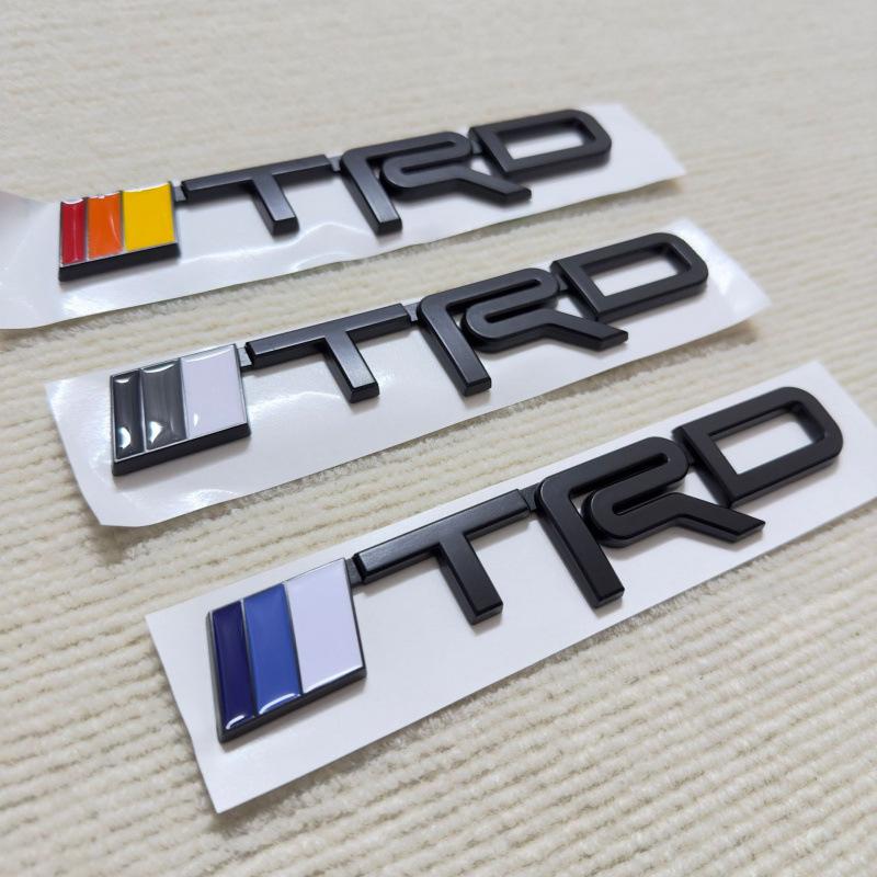 1pc TRD logo applies to Toyota Jeep Dodge body stickers Side logos Leaf panels Rear modification logos Car stickers
