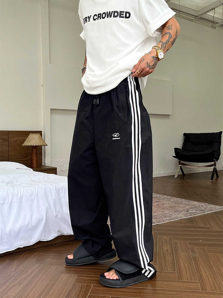 Men's vintage street-style quick-dry striped straight-leg casual pants, autumn trendy and versatile vibe loose sweatpants with a striped design aesthetic.