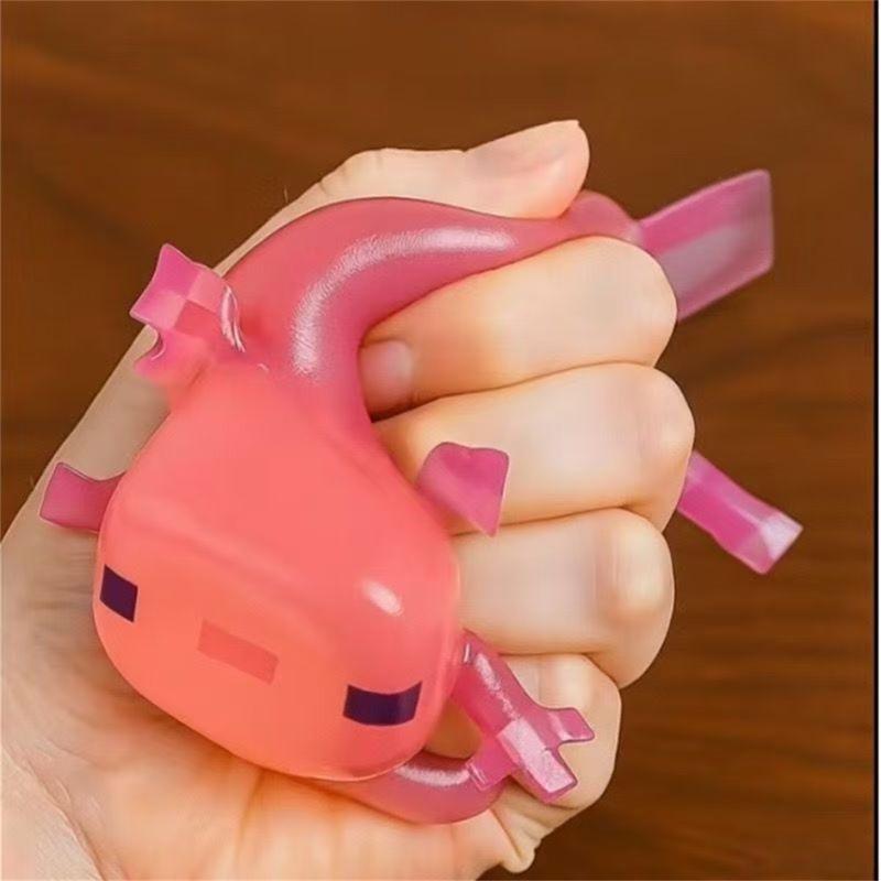 Axolotl animal-shaped squishy toy, a popular internet trend, a stress-relieving gift and gadget.
