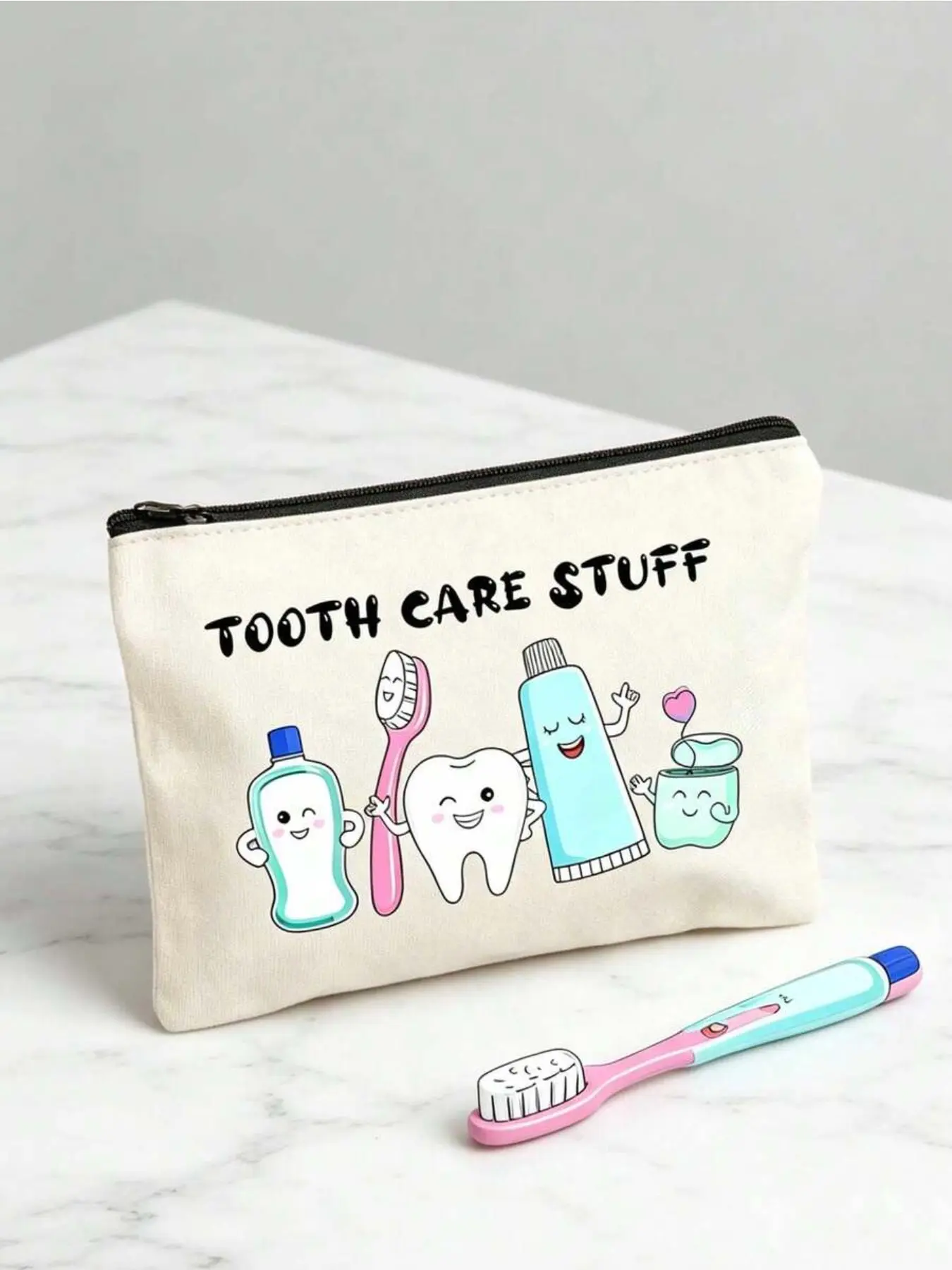 Fun cartoon dental care makeup bag with zipper closure. Portable pouch stores toothbrushes, toothpaste and oral care supplies. Creative design for daily commute, travel and beach use. Great gift for dental hygienists and travel lovers.