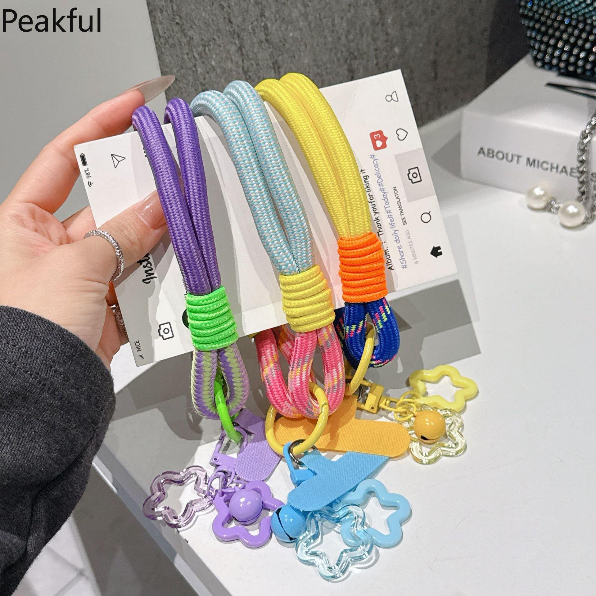 Dopamine Phone Lanyard | Viral Short Wrist Rope with Star & Bell Decor | Braided Anti-Lost Keychain Strap | Aesthetic Portable Wristband for All Phones, Ideal for Dating, Vacation, Shopping & Everyday Carry