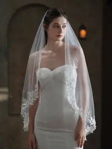 Elegant mid-length bridal veil featuring soft tulle and delicate floral lace trim—a French-inspired, affordable luxury accessory perfect for weddings and bridal photography. Wedding veils for brides