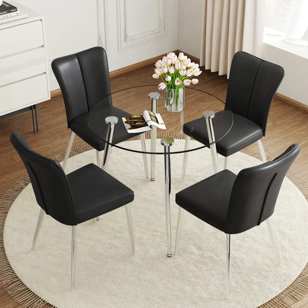 1 Table and 4 Chair Set. A Modern Minimalist Round Dining Table with Transparent Tempered Glass Top and Silver Metal Legs,paried with Chairs with PU Backrest and Seat Cushion and Silver Metal Legs.