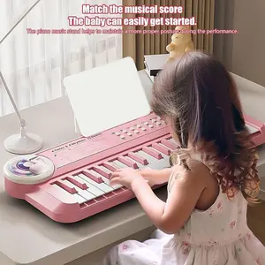 A music keyboard with clear sound, 37 keys, 5 instrument sounds,  microphone, instrument toy, music learning keyboard toy, can be plugged in via USB, can be used with AA batteries (AA batteries need to be provided)