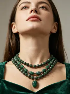 A classical and luxurious style emerald multi-layered bead necklace, with natural green stone chains and hand carved details, suitable for daily commuting, dinners, and dates. It is also a charming and exquisite small gift that can make you feel moved
