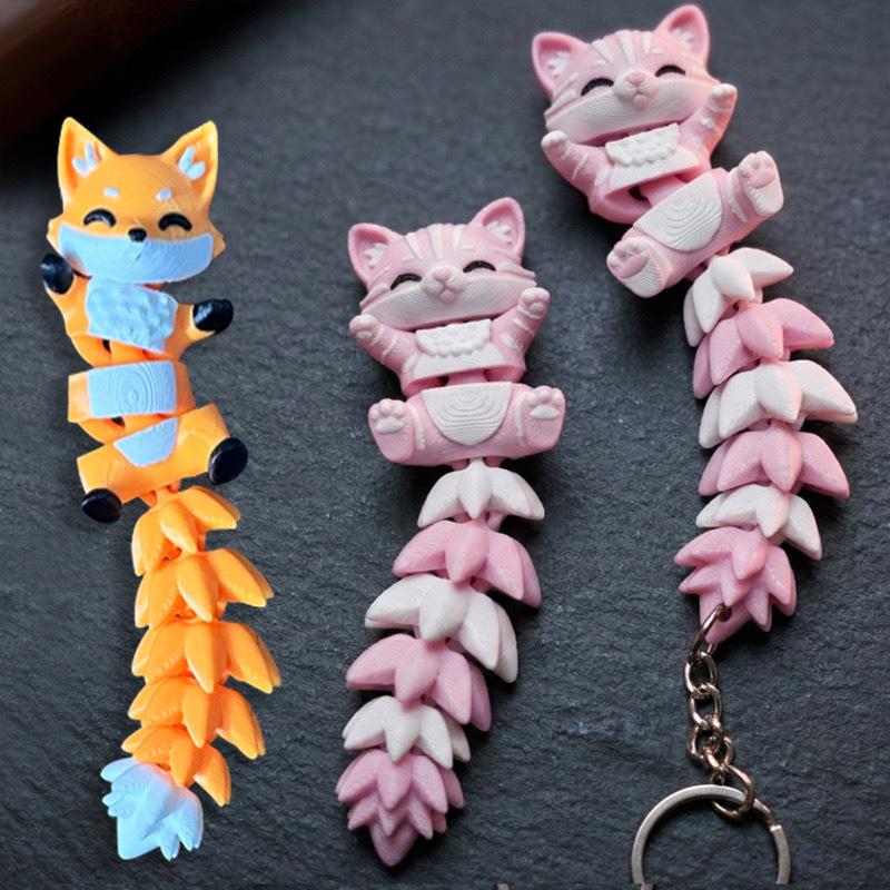 A 3D-printed keychain pendant featuring a cute little fox. The joints of the fox can move freely, making it a popular decorative item.