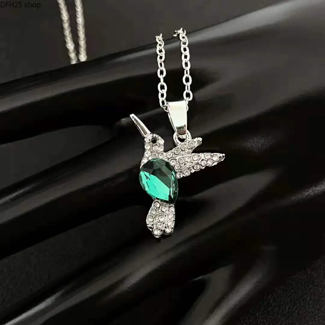 Hummingbird Pendant Necklace for Women, Silver Tone Crystal Bird Charm with Emerald Green Stone Accent, Delicate Collarbone Jewelry for Daily Wear and Parties