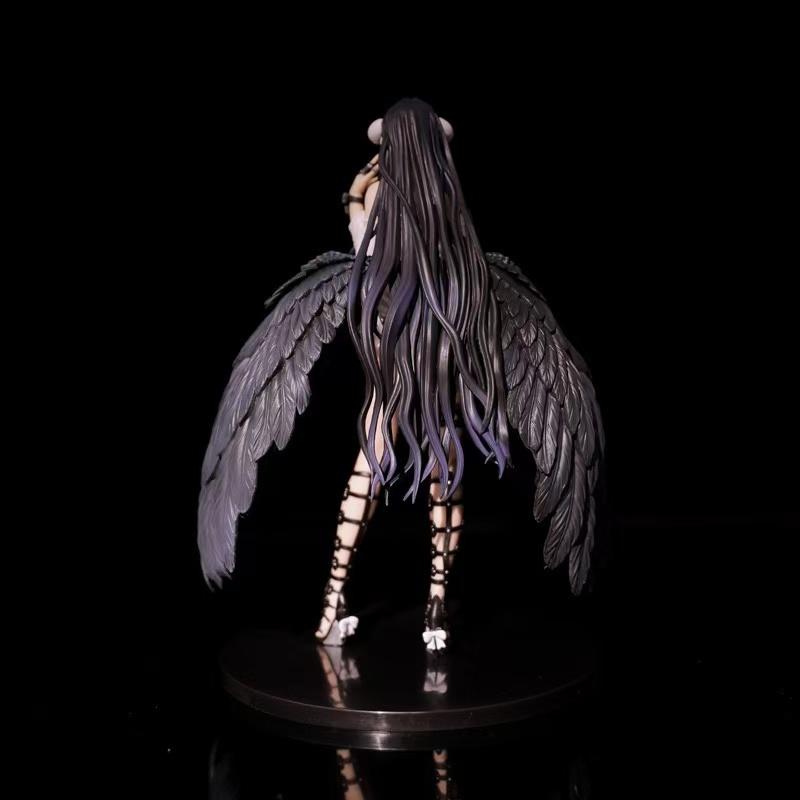 Action figure toy, figure wearing white private attire, collectible model with black feathers, packaged in a color box