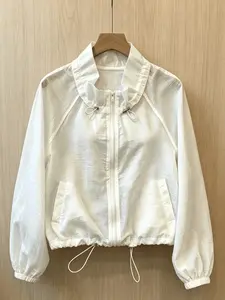 A fashionable Casual white semi transparent texture drawstring stand up collar jacket for women, with lantern cuffs and long sleeves to cover the arms, suitable for commuting, indoor and outdoor wear