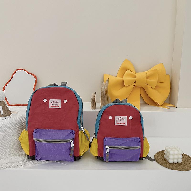 2026 New Model Children's Backpack: Simple and Lightweight Canvas Backpack for Boys and Girls, Suitable for School Season, with Spine Protection