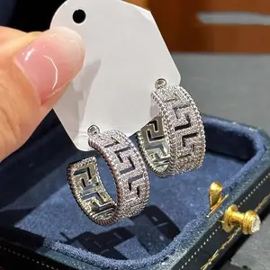 full-diamond C-shaped earrings with intricate patterns, offering a light luxury and high-end feel, versatile for everyday wear, available for dropshipping