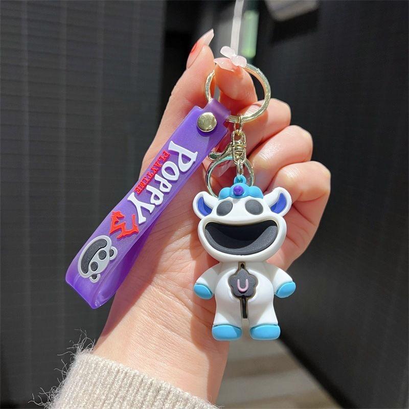 Smiling critters scary smiling animal doll keychain pink piggy blue elephant pendant