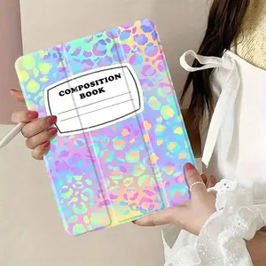 Composition book with colorful holographic leopard print cover designed for school or personal use perfect for note-taking journaling or creative writing. Compact size for easy portability.