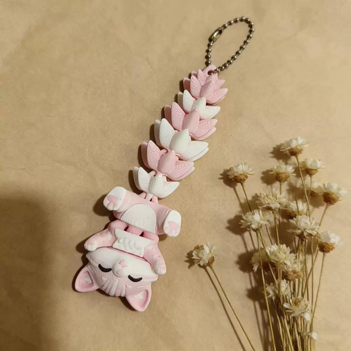 A 3D-printed keychain pendant featuring a cute little fox. The joints of the fox can move freely, making it a popular decorative item.