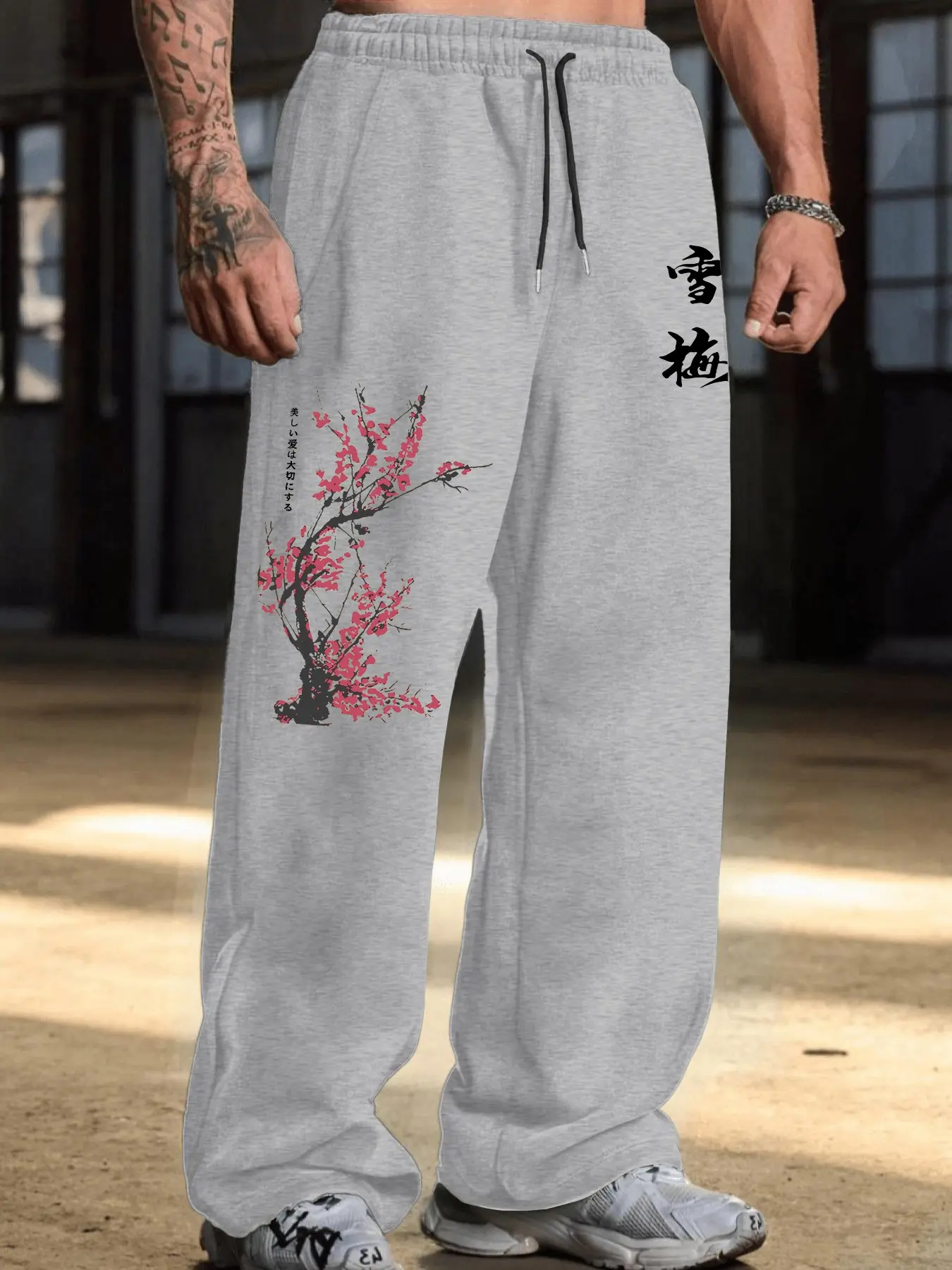 Men's Loose Wide Leg Drawstring Sweatpants, casual wear bottoms, Oriental Ink Plum Blossom Tree Japanese Vertical Text Dual Side Print Elastic Waist Streetwear Casual Jogger Trousers #PlumBlossomPants #OrientalStreetwear #HarajukuGraphicPants #AsianAesthe