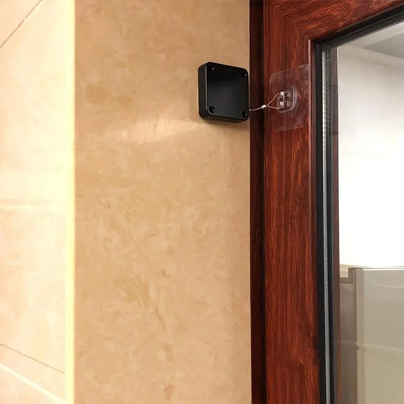 No drilling required door closer A drilling-free automatic door closer with a telescopic design, suitable for multi-functional automatic security doors in both residential and commercial settings. Easy to install.