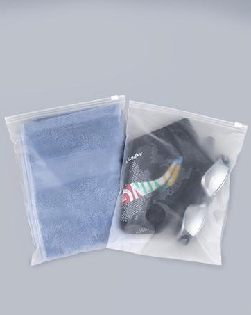 100pcs Clothing Packaging Bags for Shipping - 10x13 Inch Plastic Frosted Bags for Travel Storage or Small Businesses- Zipper Apparel Bag for Shirts, Socks, Underwear, and Documents -No Vent Holes