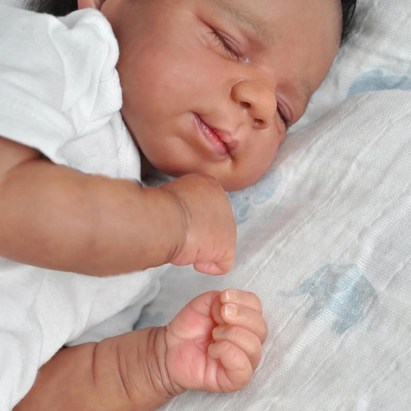 19-Inch Soft Silicone Reborn Baby Doll - Realistic Newborn Bebe Girl with Black Skin, Cloth Body, and Lovely Facial Expression - Ideal Birthday Gift for Kids
