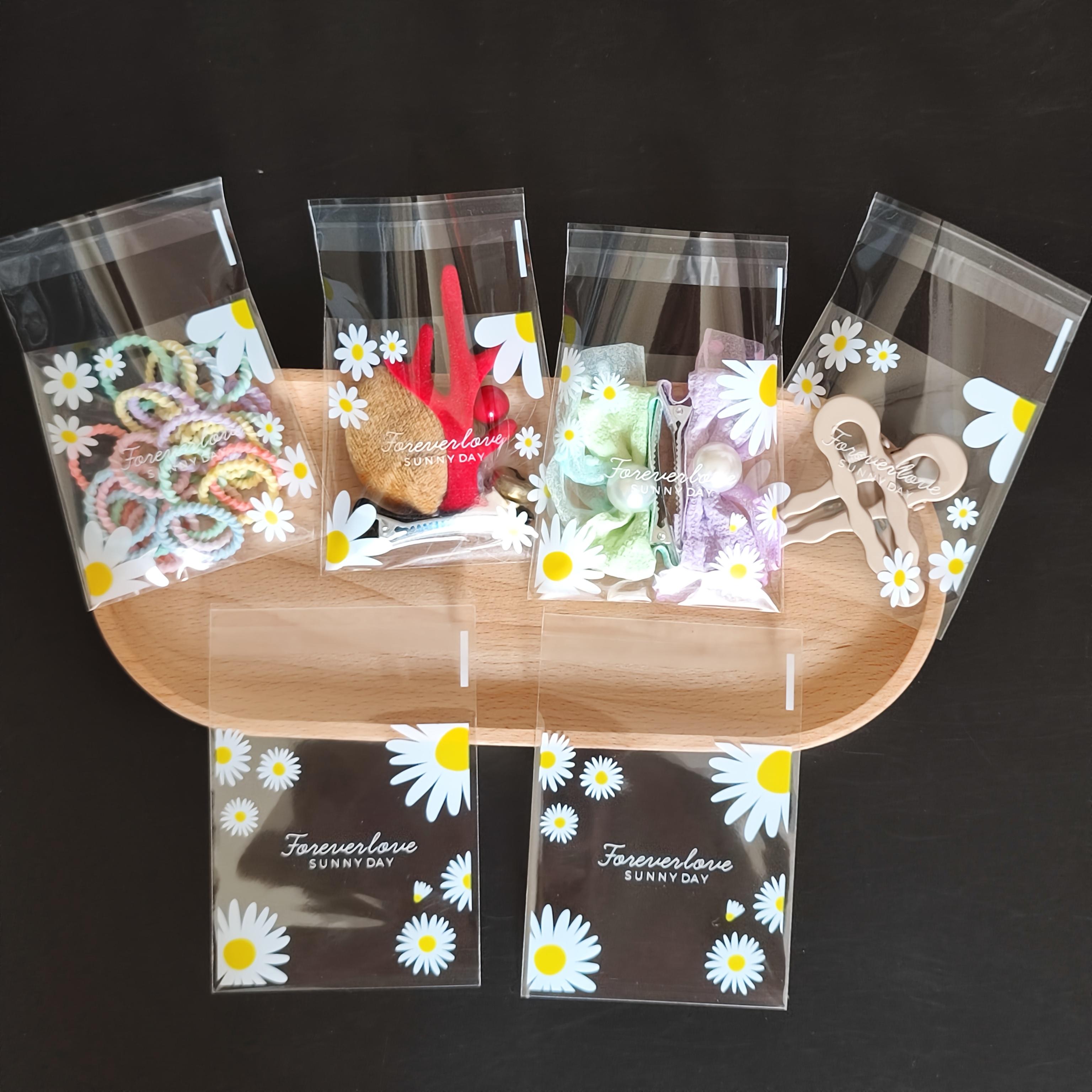 100pcs daisy print gift bag, transparent self-adhesive small packaging bag suitable for wedding return gifts, birthday tea parties, small gift packaging, independent packaging bags for biscuit baking all year round