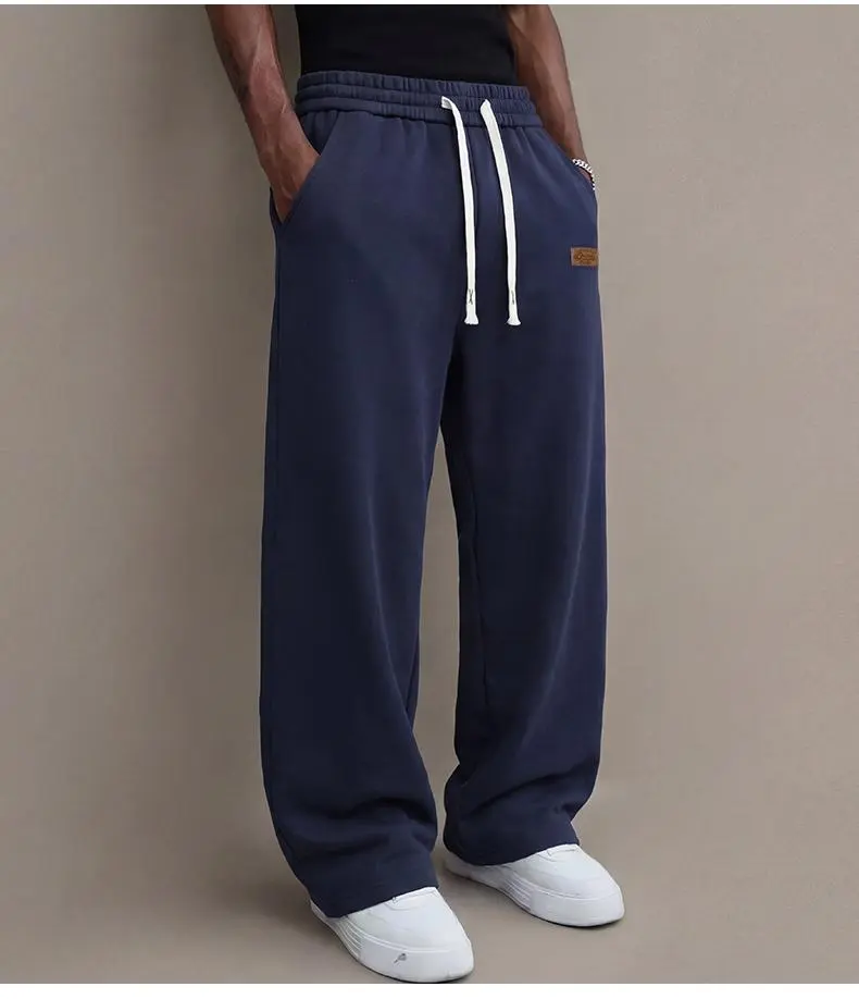 Men’s casual pants for autumn, cotton-blend stretch fabric, comfortable athletic-casual long pants with a loose straight fit; suitable for everyday wear and commuting; versatile sweatpants with drawstring; simple men’s casual pants. Men’s casual pants for autumn, cotton-blend stretch fabric, comfortable athletic-casual long pants with a loose straight fit; suitable for everyday wear and commuting; versatile sweatpants with drawstring; simple men’s casual pants.