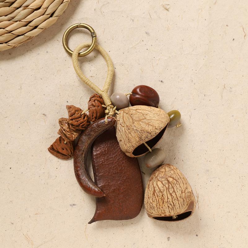 Naturally handcrafted fruit shell bell, with seeds, sound therapy handbell, wish-fulfilling fruit bag ornament, Yunnan specialty gift, mobile phone decoration accessory