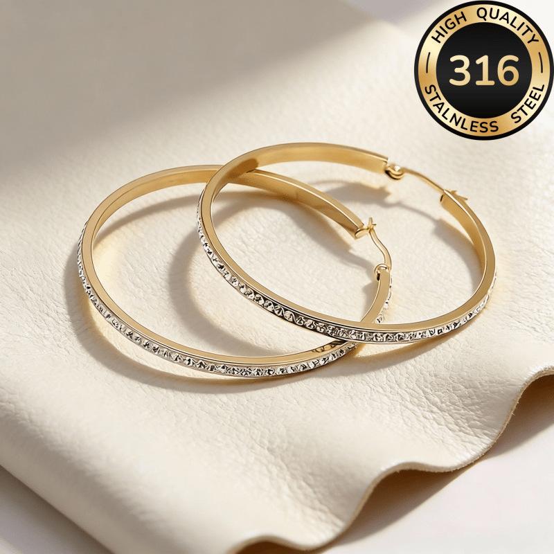 Round stainless steel diamond-encrusted earrings, a fashionable and light luxury accessory for women with large circular stud earrings