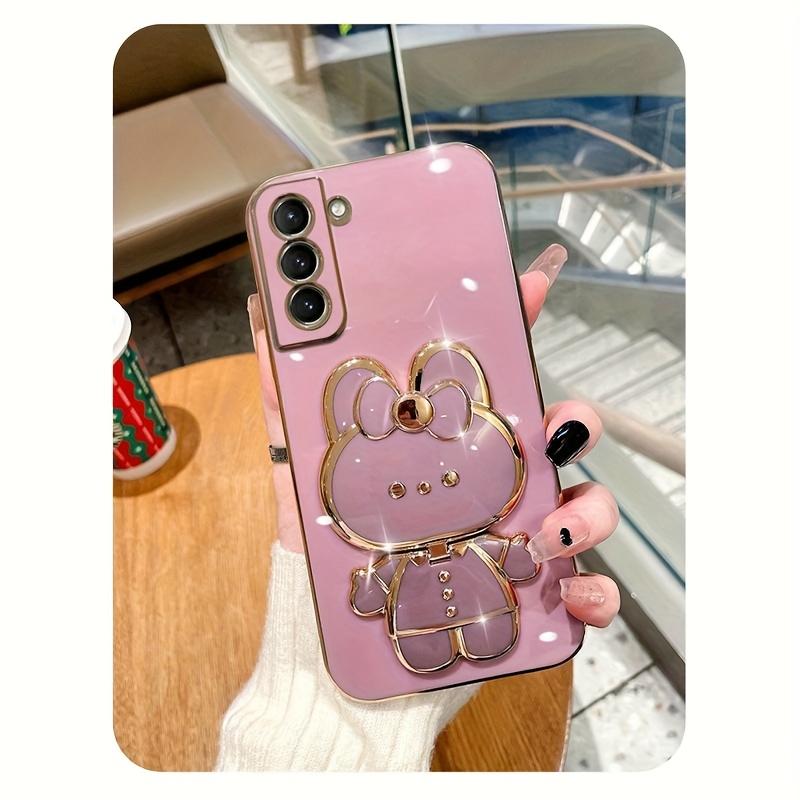 New rabbit-shaped adhesive phone stand with makeup mirror is suitable for iPhone, Samsung, Xiaomi phones, and various other phones. The rabbit phone case desktop stand is a hollow-out lazy stand