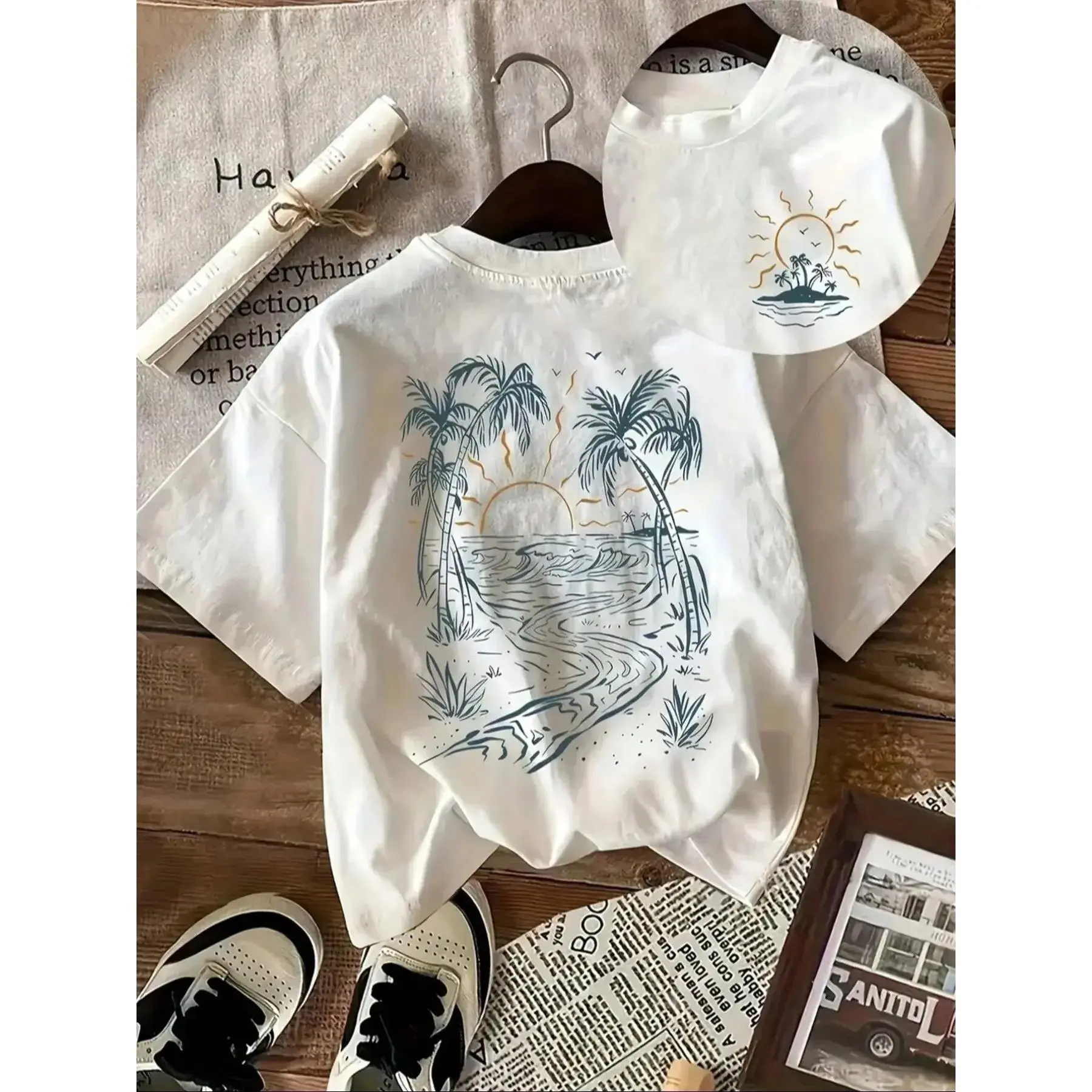 Front Mini Island Logo Back Palm Tree Sunset Beach Line Art T-Shirt, Tropical Coastal Vacation Front And Back Print Casual Graphic Tee, loose oversized women top, soft breathable fabric, suitable for seaside travel. Perfect gift for ocean lovers, summer c