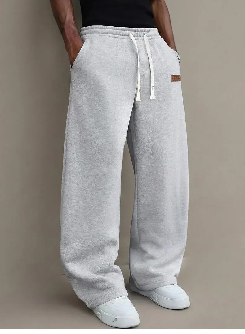 Men’s casual pants for autumn, cotton-blend stretch fabric, comfortable athletic-casual long pants with a loose straight fit; suitable for everyday wear and commuting; versatile sweatpants with drawstring; simple men’s casual pants. Men’s casual pants for autumn, cotton-blend stretch fabric, comfortable athletic-casual long pants with a loose straight fit; suitable for everyday wear and commuting; versatile sweatpants with drawstring; simple men’s casual pants.