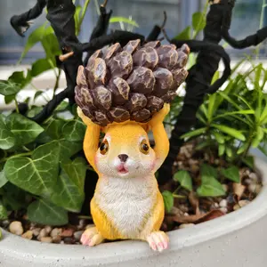 Squirrel holding a pine cone, realistic small animal ornament made of resin, fun and creative, cute and amusing for garden and outdoor use