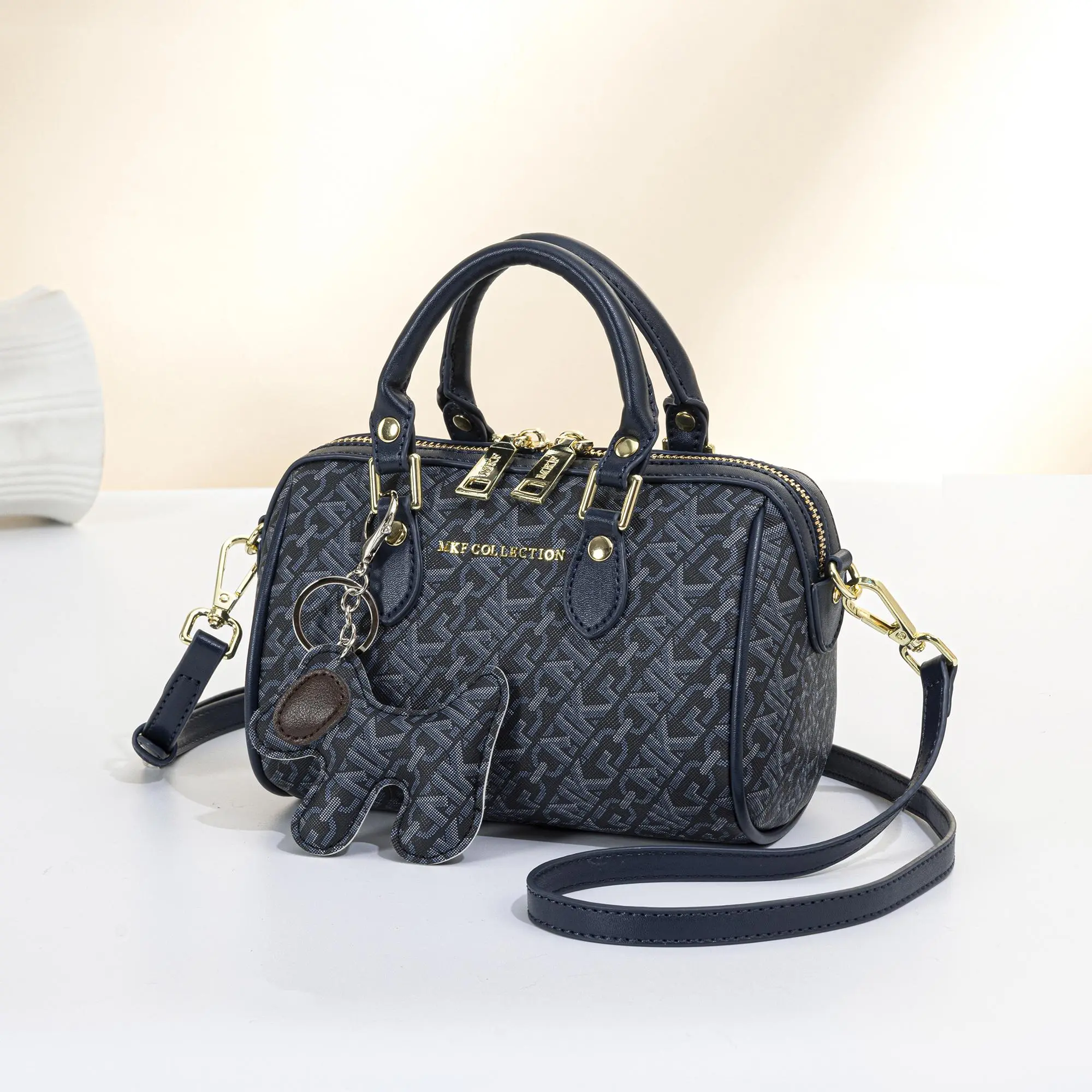 2026 New Stylish MKF Light Luxury Navy Floral Mini Handbag Original Brand Bag Vintage Top Handle Boston Bag with Puppy Charm Fashion Floral PVC Pillow Bag Golden Zipper Adjustable Shoulder Strap Casual Shoulder Crossbody Bag Her Carry Bag Daily Comm