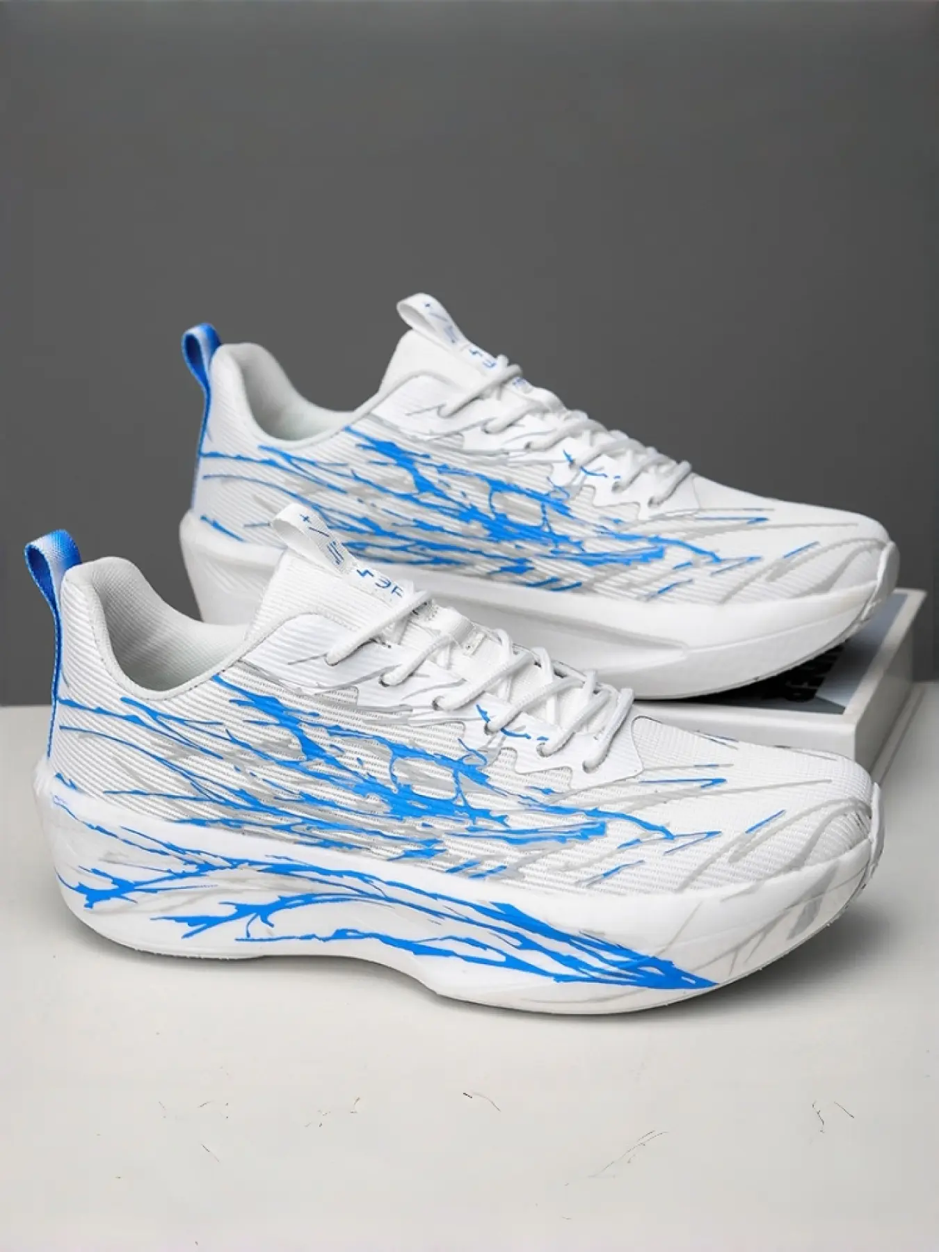 Unisex Lightning Texture Racing Shoes: Breathable Flyknit Mesh Upper, Gradient Blue Accents, Cushion Platform Sole. For Racing/Trendy Styling