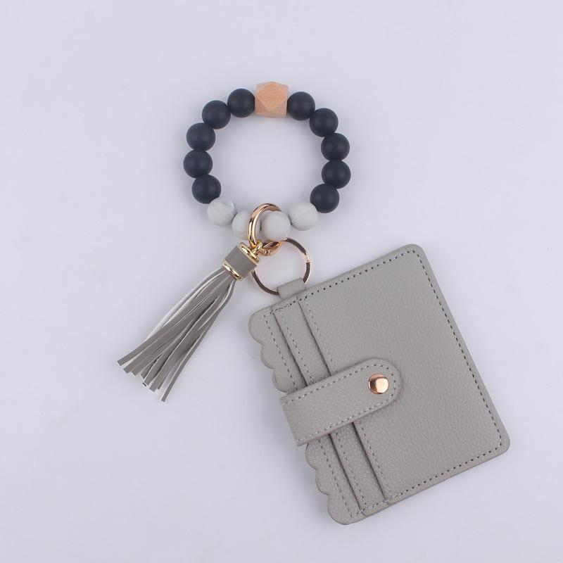 Silicone bead bracelet card holder accessories, silicone bead wristband, PU tassel women's wallet, leather tassel keychain