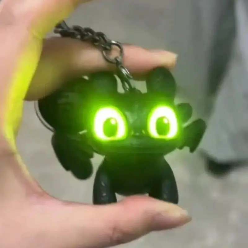 Glowing toothless baby keychain with movable wings, plush doll pendant glowing creative night accessory bag decoration, fun gift