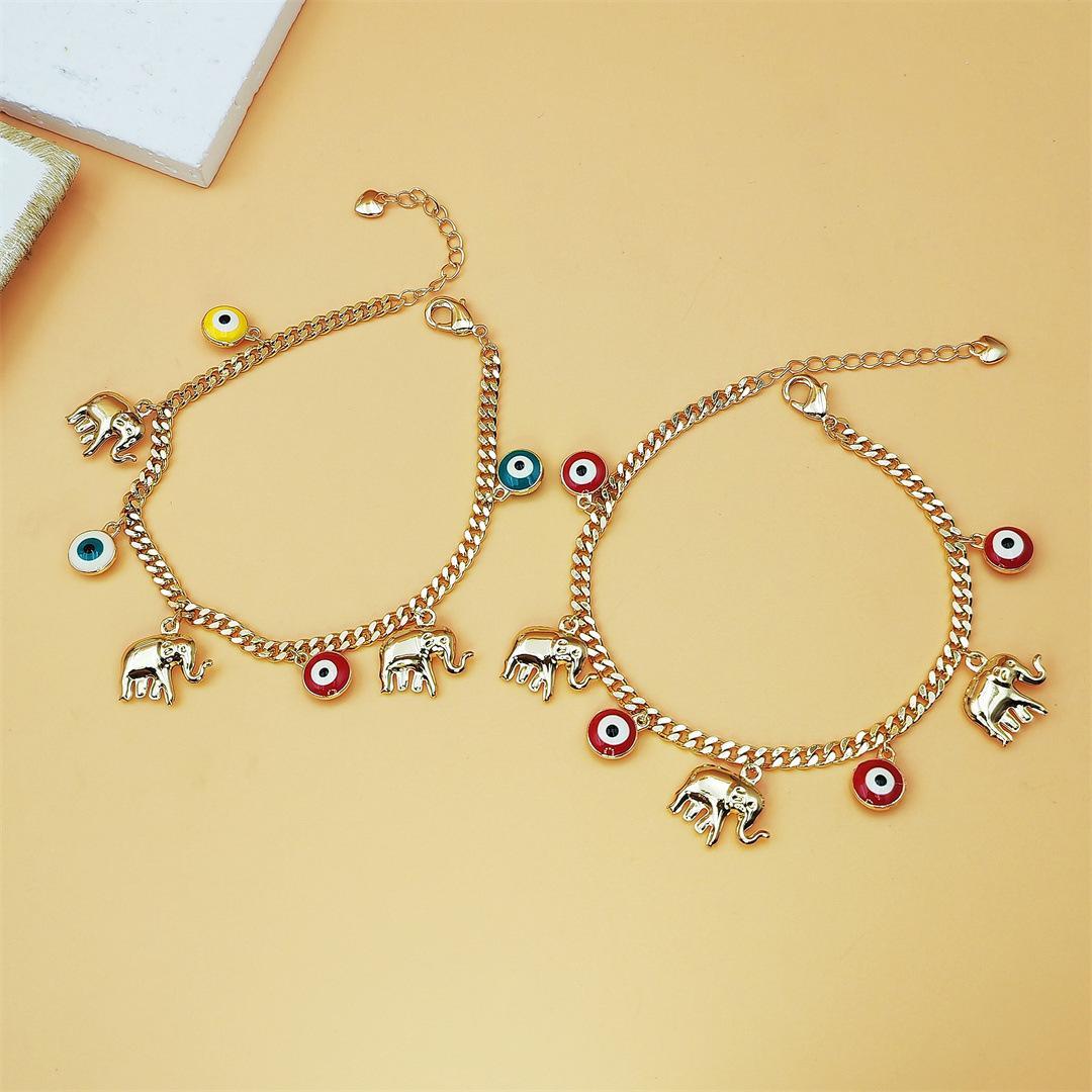 Gold Devil's Eye Lucky Elephant AnkletY2K Aesthetic Red Evil Eye Pendant Anklet Adjustable Gold Plated Chain Anklet for Party Birthday Holiday Gift Daily Wearwith Baby Elephant Pendant Adjustable Length for Stylish Accessory