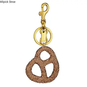 Women's Cute Bag Charm - Elegant Gold Color Finish Pretzel Design, Clip-On Purse Accessory, Trendy Keychain Pendant for Daily Fashion & Gifting