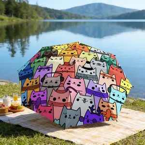Portable folding umbrella The umbrella features a pattern of colorful cartoon cats wearing various accessories like hats and glasses. Suitable for daily travel use, holiday Gift