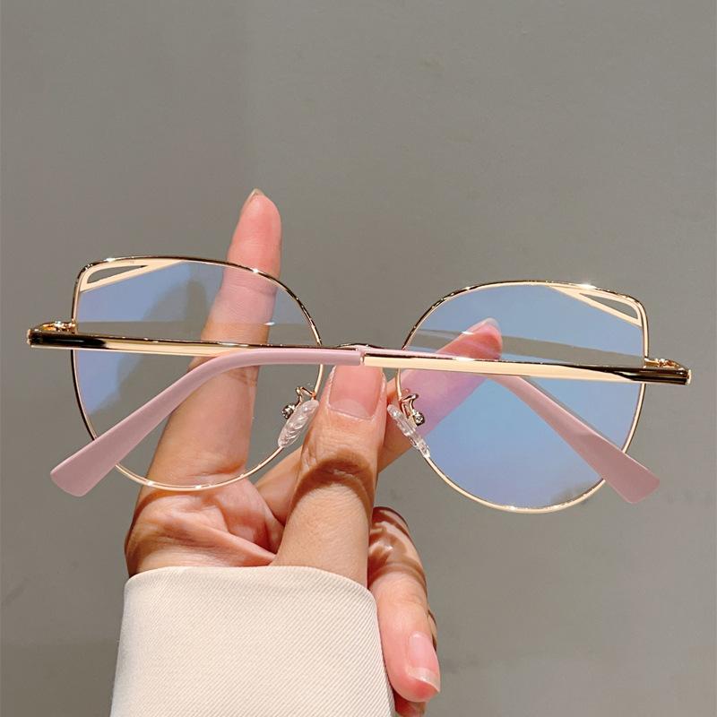 High quality cat eye hollow metal eyeglass frame fashion simple anti blue light glasses for women Computer goggles flat lens