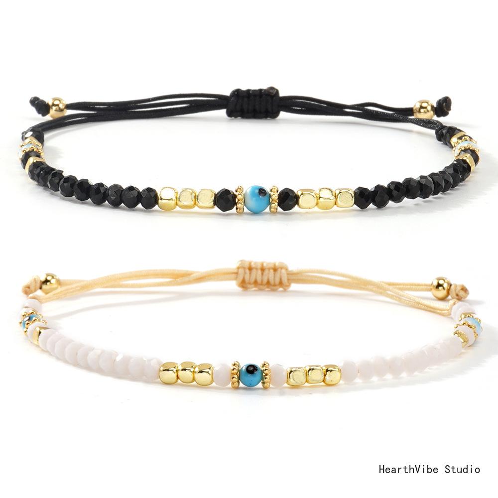 "Eye of the Demon" Couples' Bracelets: Black & White Crystal Beaded Set (2 Pieces) — Versatile, Hand-Woven Wristbands