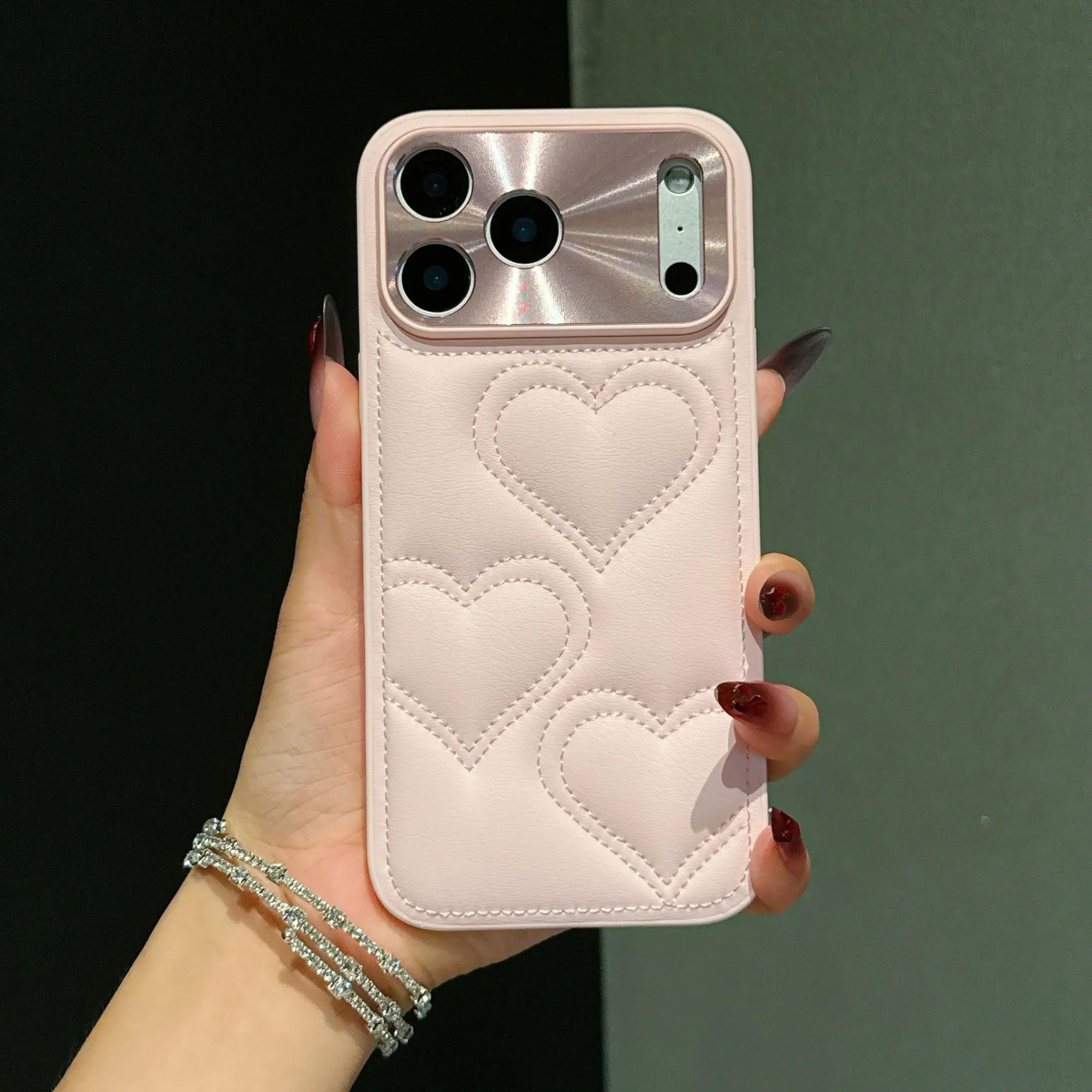 Fashionable stitched puff heart full-cover anti-drop phone case suitable for IP17/16/15promax, with aurora window, precise hole positioning, anti-fingerprint soft back panel, an emotional gift