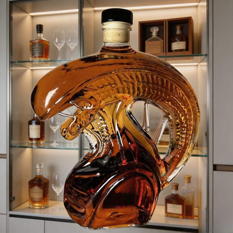 The Monster Decanter—an alien-themed glass decanter inspired by classic movie monsters. An exceptional collectible, it seamlessly combines the practical function of holding spirits with the decorative aesthetic of a creative display piece. (Glass)