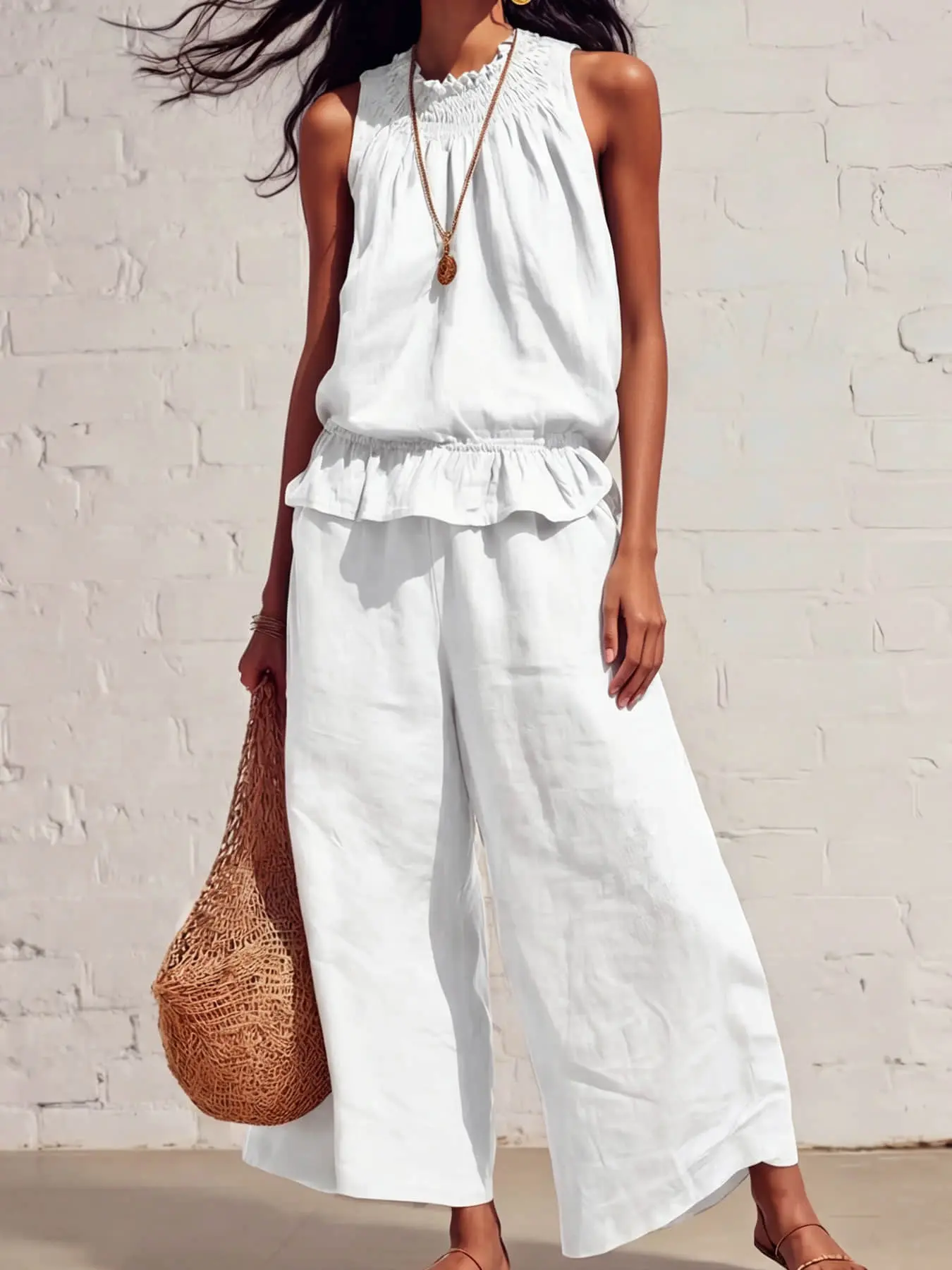 Two-piece women's loose-fitting solid-color set, Summer matching set, featuring a pleated sleeveless halter top with ruffle trim and a loose-fitting wide-leg pants, ideal for summer, vacation, travel, music festivals
