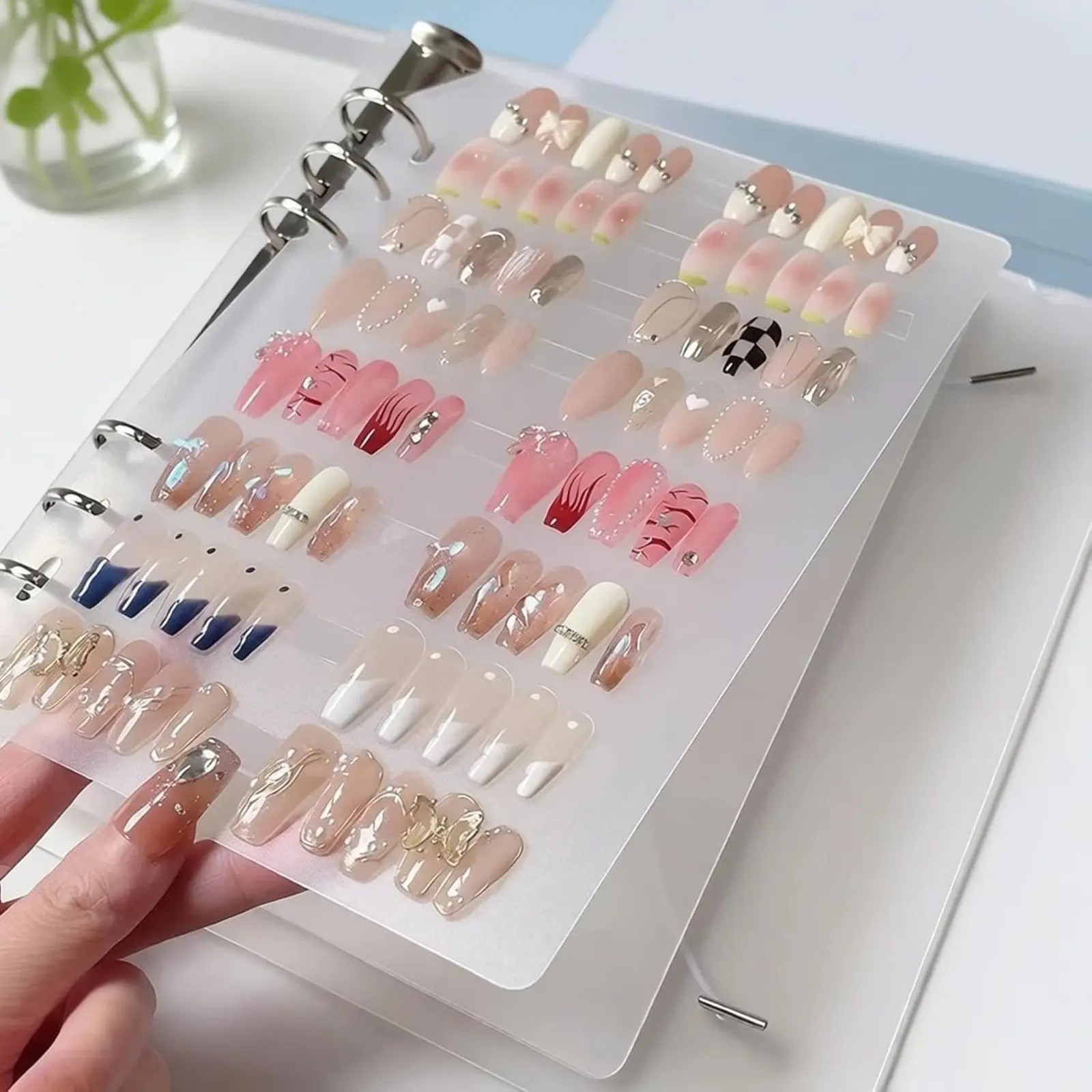 Portable A5 Press On Nail Storage & Display Book with 6 Inserts & 120 Double-Sided Adhesive Tabs, Reusable Clear Binder for Nail Art