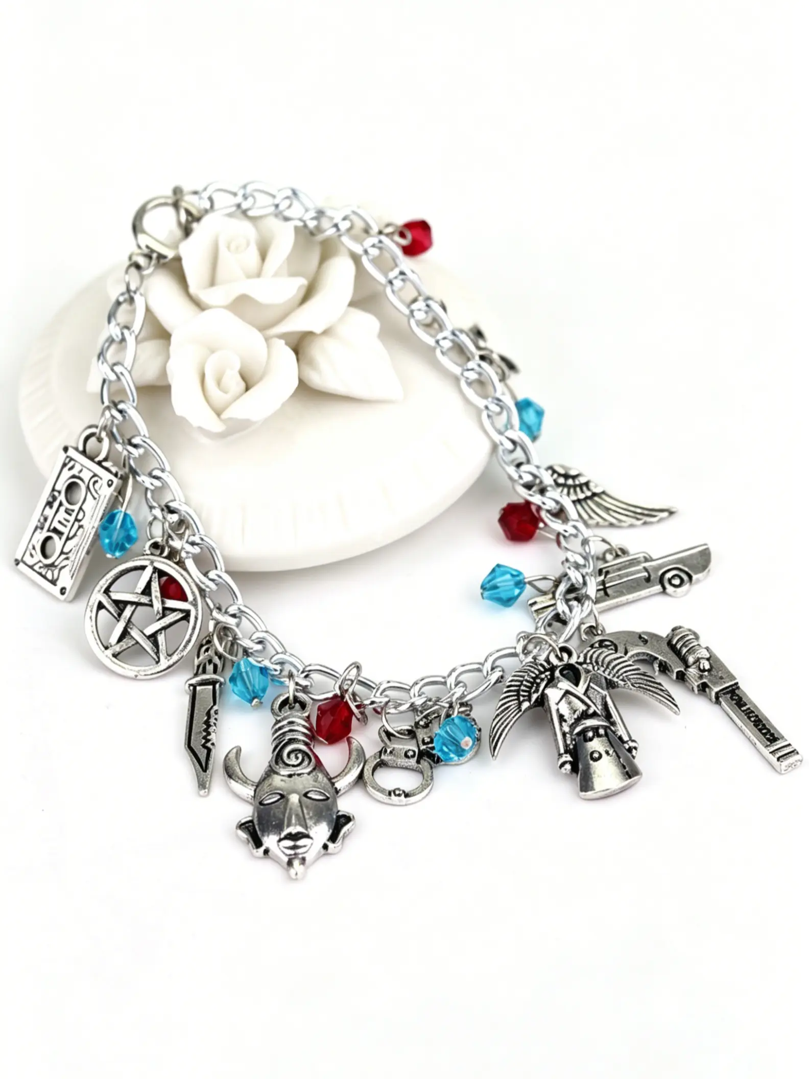 Vintage Silver Color Bracelet with Multiple Charms, Star, Horn, Tape, Wing, Gun Charms, Blue Beads, Round Clasp, Unique Fashion Accessory