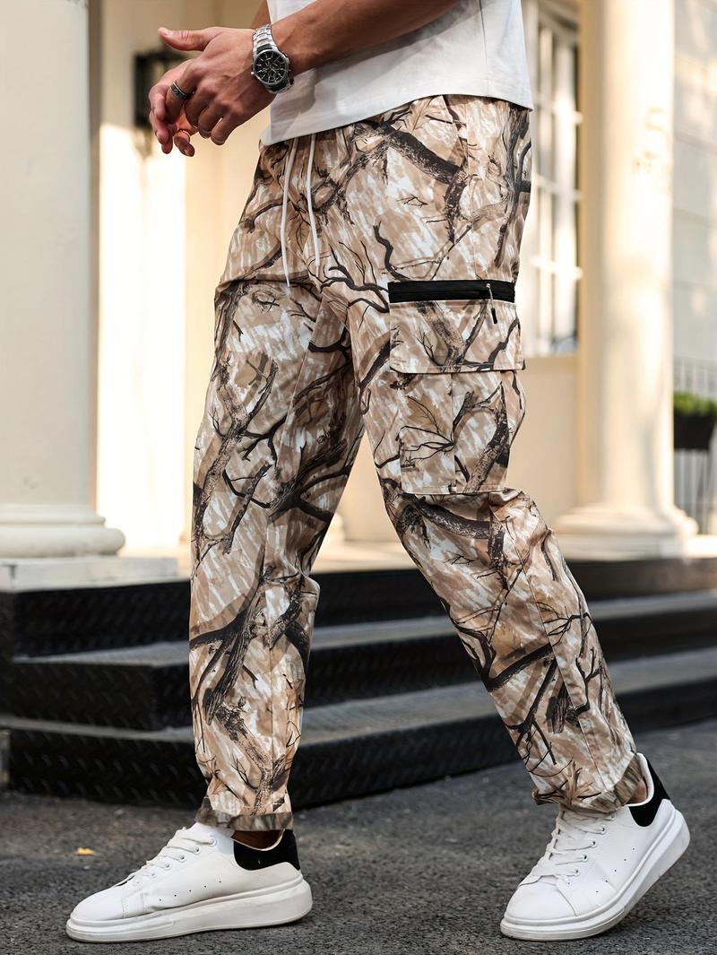 Men's camouflage print zippered pocket trousers, slim-fit athletic pants, durable trousers for autumn, men's wear-resistant outdoor training pants, streetwear fashion, vacation wear, men's clothing