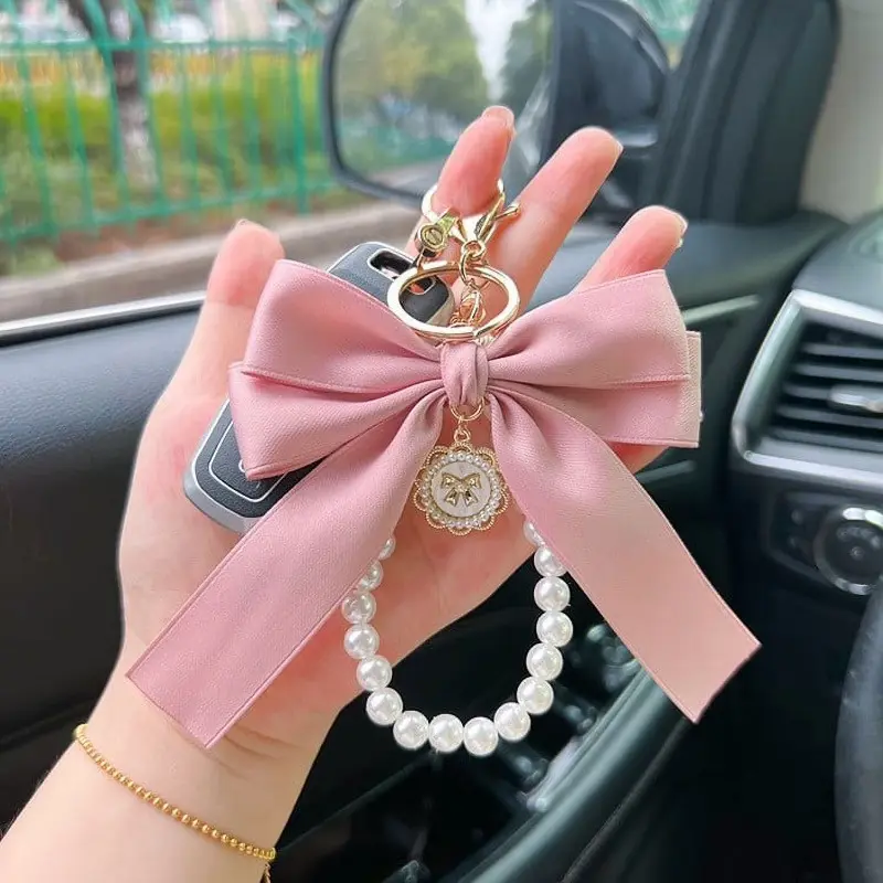 Women's Bow and Pearl Keychain with Wrist Lanyard – Cute Bag Charm, Fabric Bow Accessory, Car Key Ring